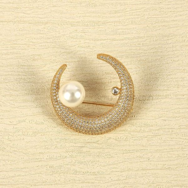 Crescent Shape With A Brooch