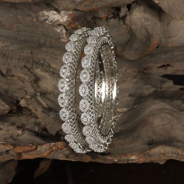 Silver Polish Diamond bangles In Pacheli Pattern