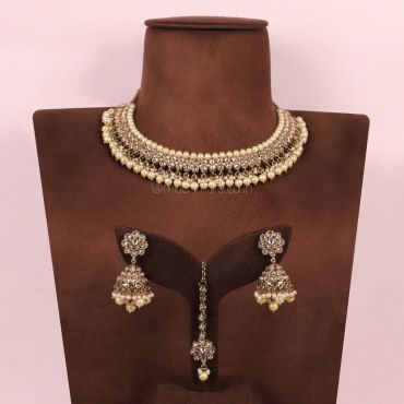 Pearl Hanging Necklace With Matching Tikka And Designer Jhumkas